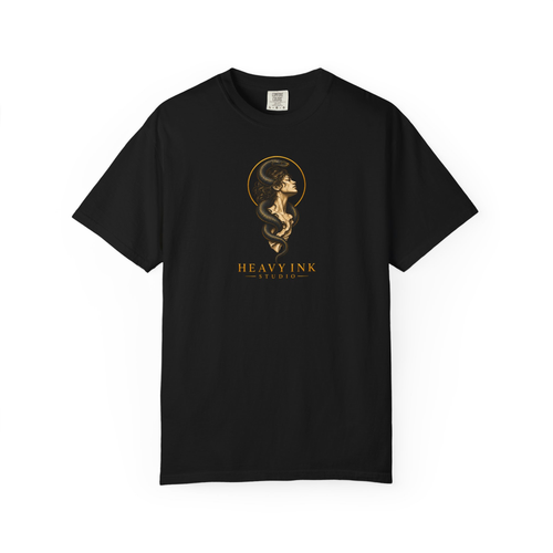Gilded Serpent tee in Black, front view with a centered classical bust, black serpent, gold halo and Heavy Ink Studio wordmark