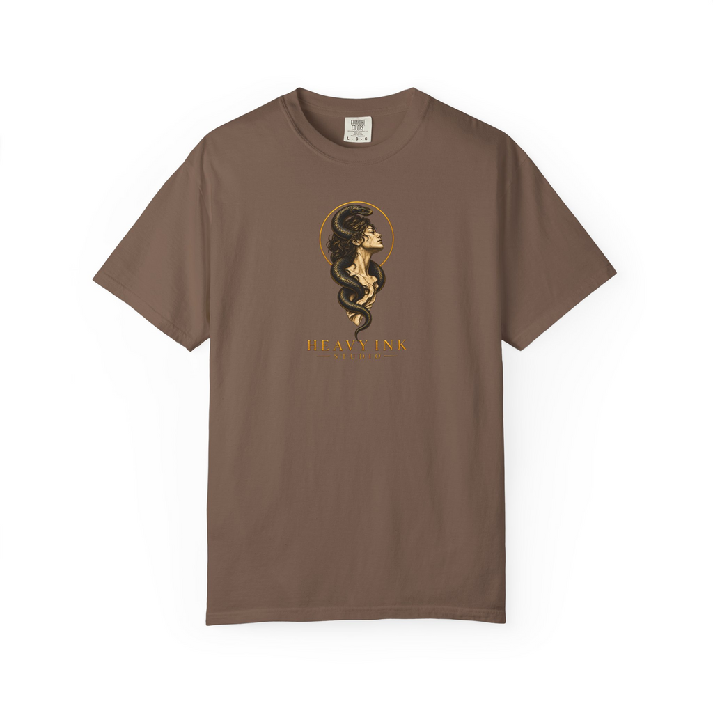 Gilded Serpent tee in Espresso, front view with a centered classical bust, black serpent, gold halo and Heavy Ink Studio wordmark