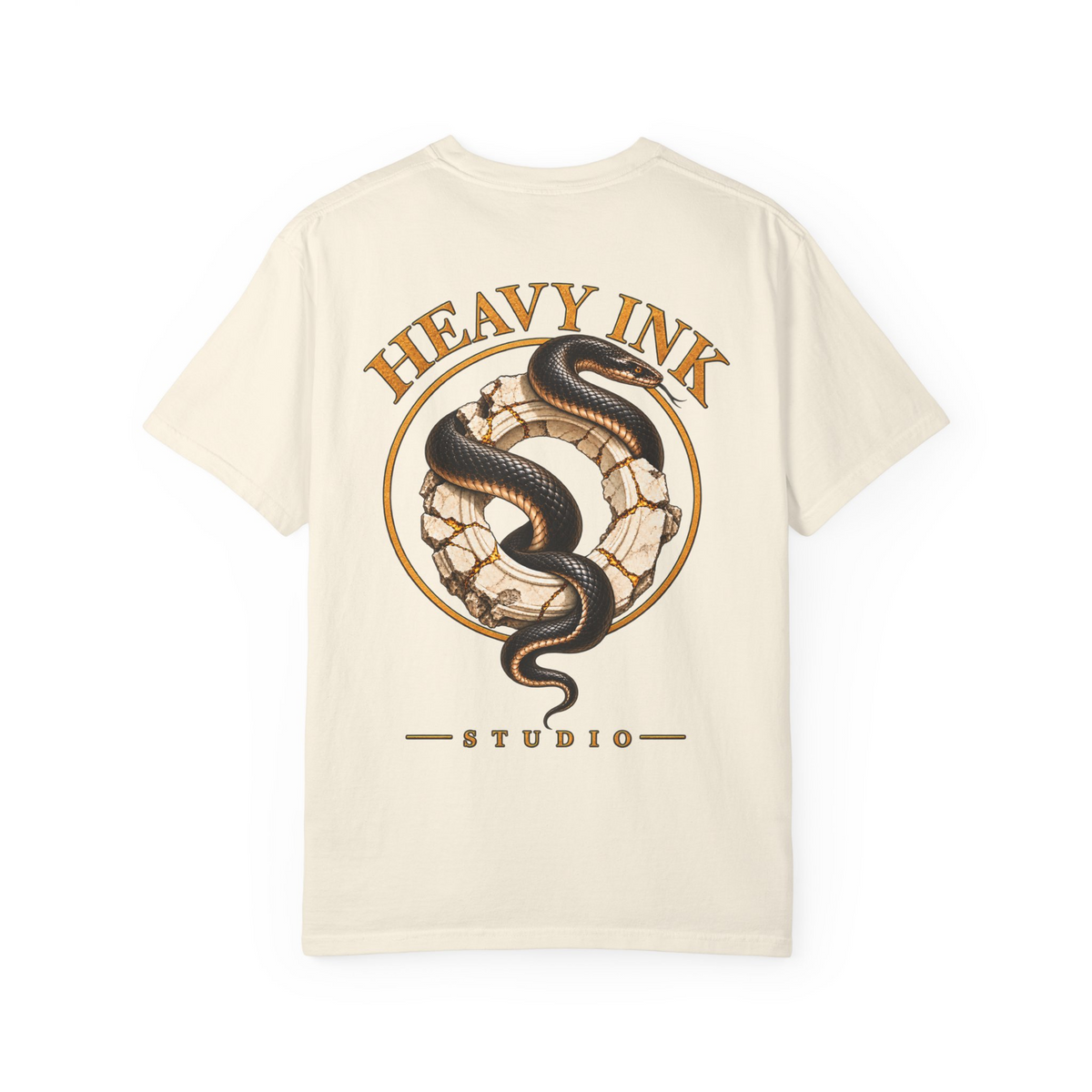 Gilded Serpent tee in Ivory, back view with a black serpent wrapped through a cracked ivory stone ring, gold halo and Heavy Ink Studio lettering